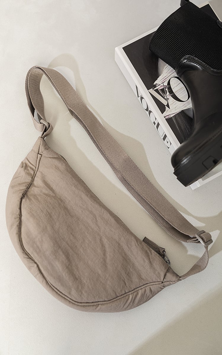 She Wears Glory™ Dumpling Round Mini Shoulder Bag