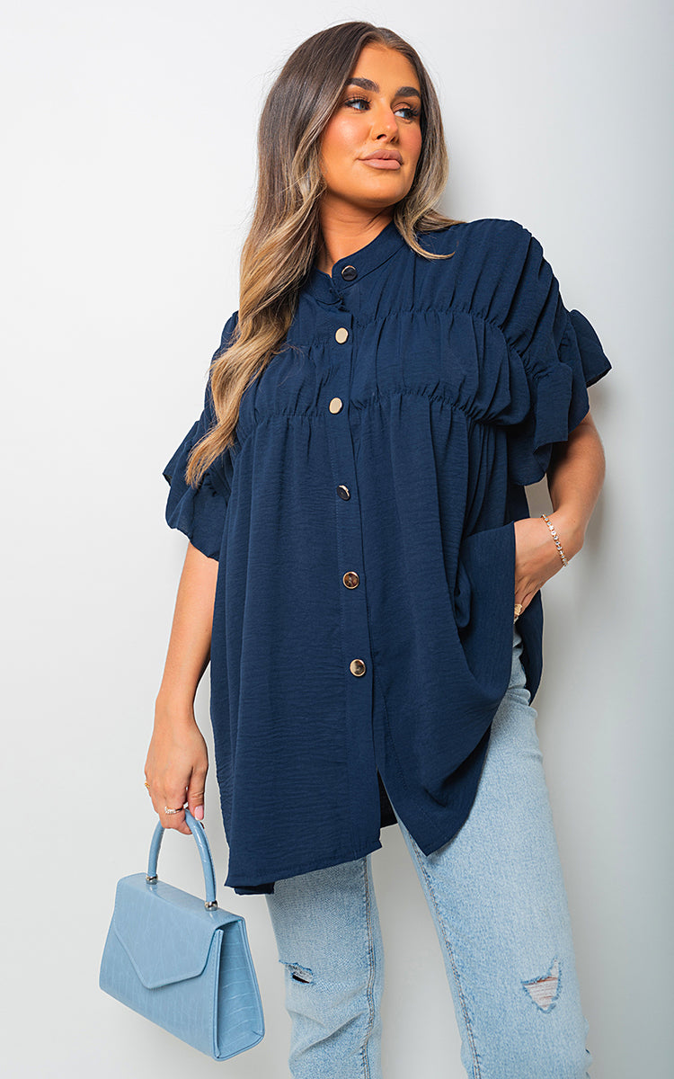 She Wears Glory™ Button Down Pleated Frill Tops