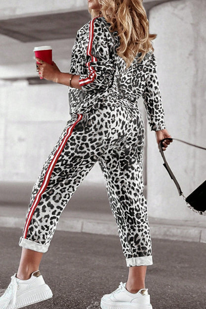 She Wears Glory™ “Fearless Radiance” Plus Size Leopard Round Neck Top and Pants Set - She Wears Glory Beverly Hills