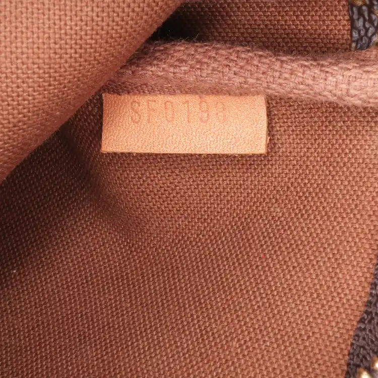 Louis Vuitton Monogram Mini Pochette Accessoires