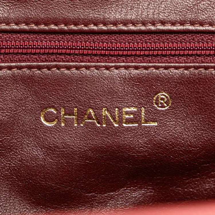 Chanel Quilted Suede Metal Frame Handbag