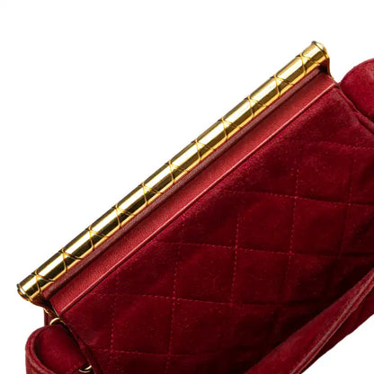 Chanel Quilted Suede Metal Frame Handbag