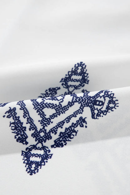 She Wears Glory™ — Radiant Grace Printed V-Neck Blouse - She Wears Glory Beverly Hills