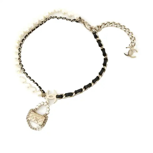 Chanel Gold Plated Chain And Faux Pearl Flap Bag Pendant Necklace