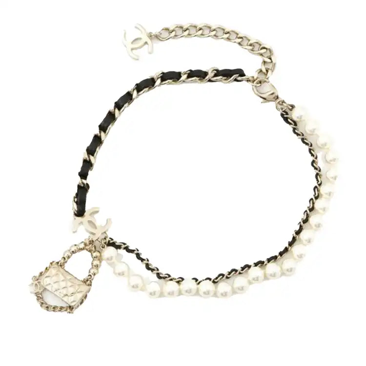 Chanel Gold Plated Chain And Faux Pearl Flap Bag Pendant Necklace