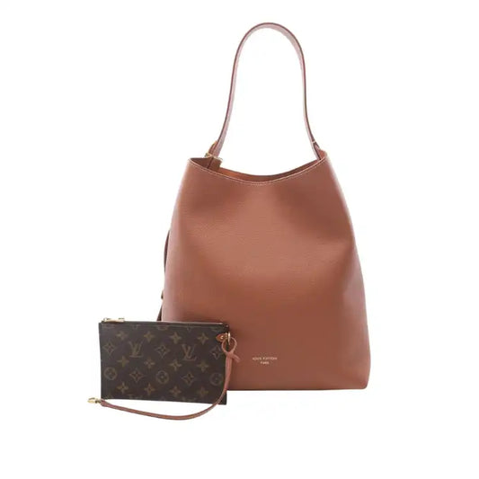 Louis Vuitton Grained Calfskin Low Key Hobo MM