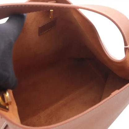 Louis Vuitton Grained Calfskin Low Key Hobo MM