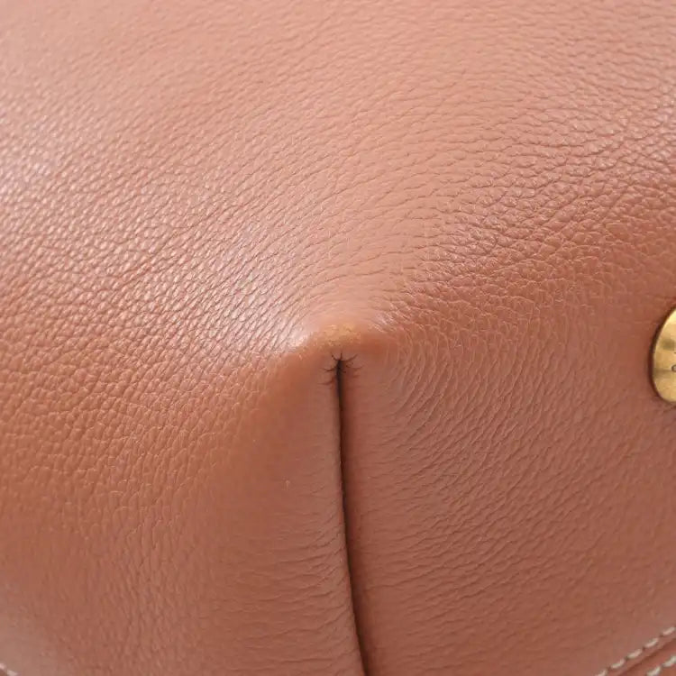 Louis Vuitton Grained Calfskin Low Key Hobo MM