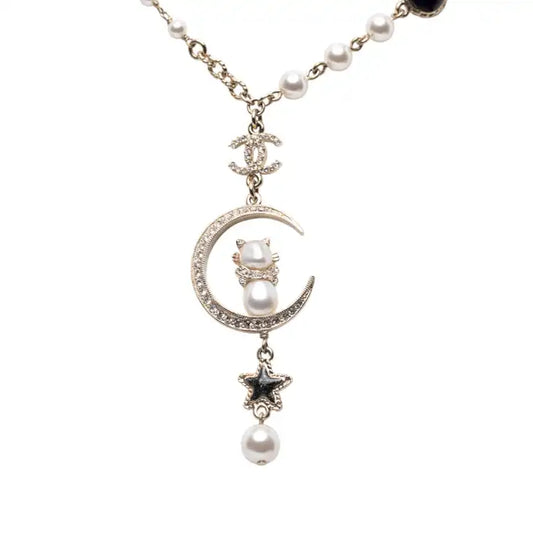 Chanel Gold Plated CC Rhinestones and Faux Pearl Sun Moon Cat Pendant Necklace