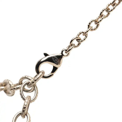 Chanel Gold Plated CC Rhinestones and Faux Pearl Sun Moon Cat Pendant Necklace