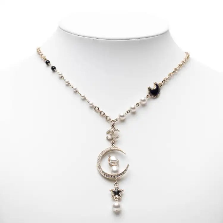 Chanel Gold Plated CC Rhinestones and Faux Pearl Sun Moon Cat Pendant Necklace