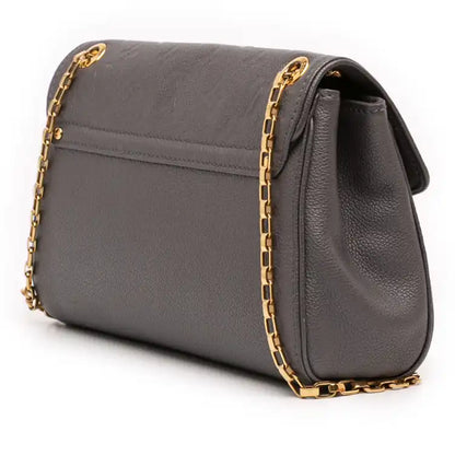 Louis Vuitton Monogram Empreinte Studded Saint Germain PM