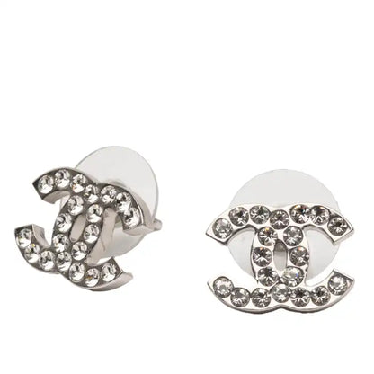 Chanel  Silver Plated CC Rhinestone Push Back Earrings