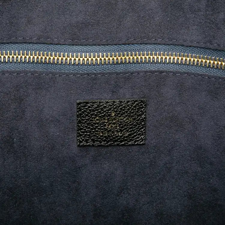 Louis Vuitton Monogram Giant Empreinte Neverfull MM