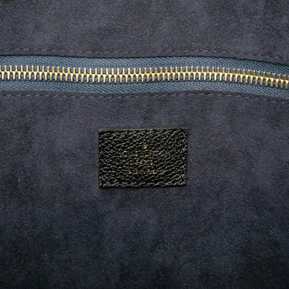 Louis Vuitton Monogram Giant Empreinte Neverfull MM