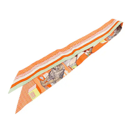 Hermès Grand Theatre Nouveau Silk Twilly Scarf