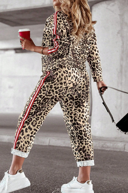 She Wears Glory™ “Fearless Radiance” Plus Size Leopard Round Neck Top and Pants Set - She Wears Glory Beverly Hills