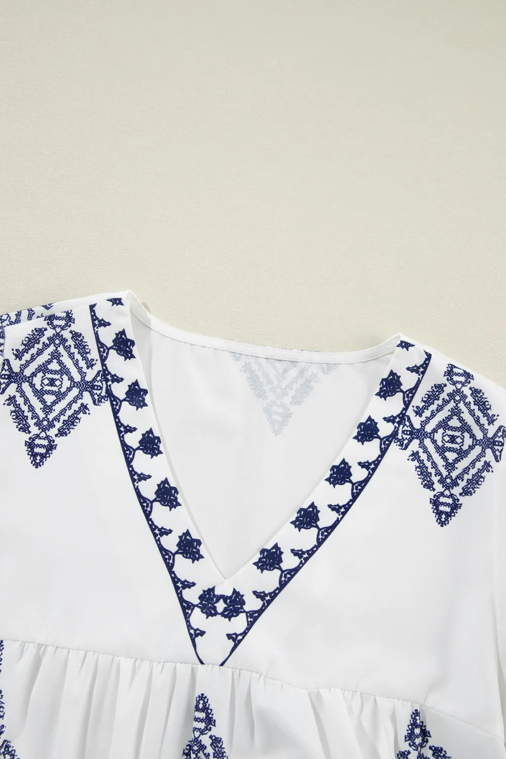 She Wears Glory™ — Radiant Grace Printed V-Neck Blouse - She Wears Glory Beverly Hills