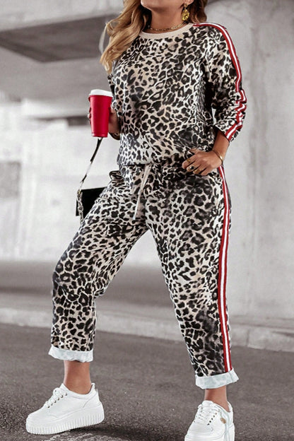 She Wears Glory™ “Fearless Radiance” Plus Size Leopard Round Neck Top and Pants Set - She Wears Glory Beverly Hills
