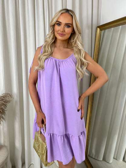 She Wears Glory™ Backless Tie-up Spaghetti Strap Frill Hem Mini Dress