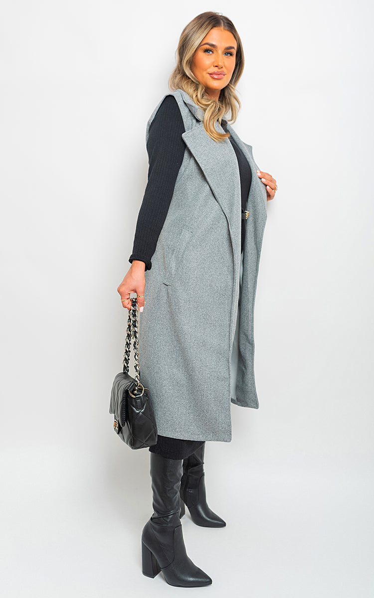 She Wears Glory™ Longline Sleeveless Wide Lapel Waist Tie Jacket - She Wears Glory Beverly Hills