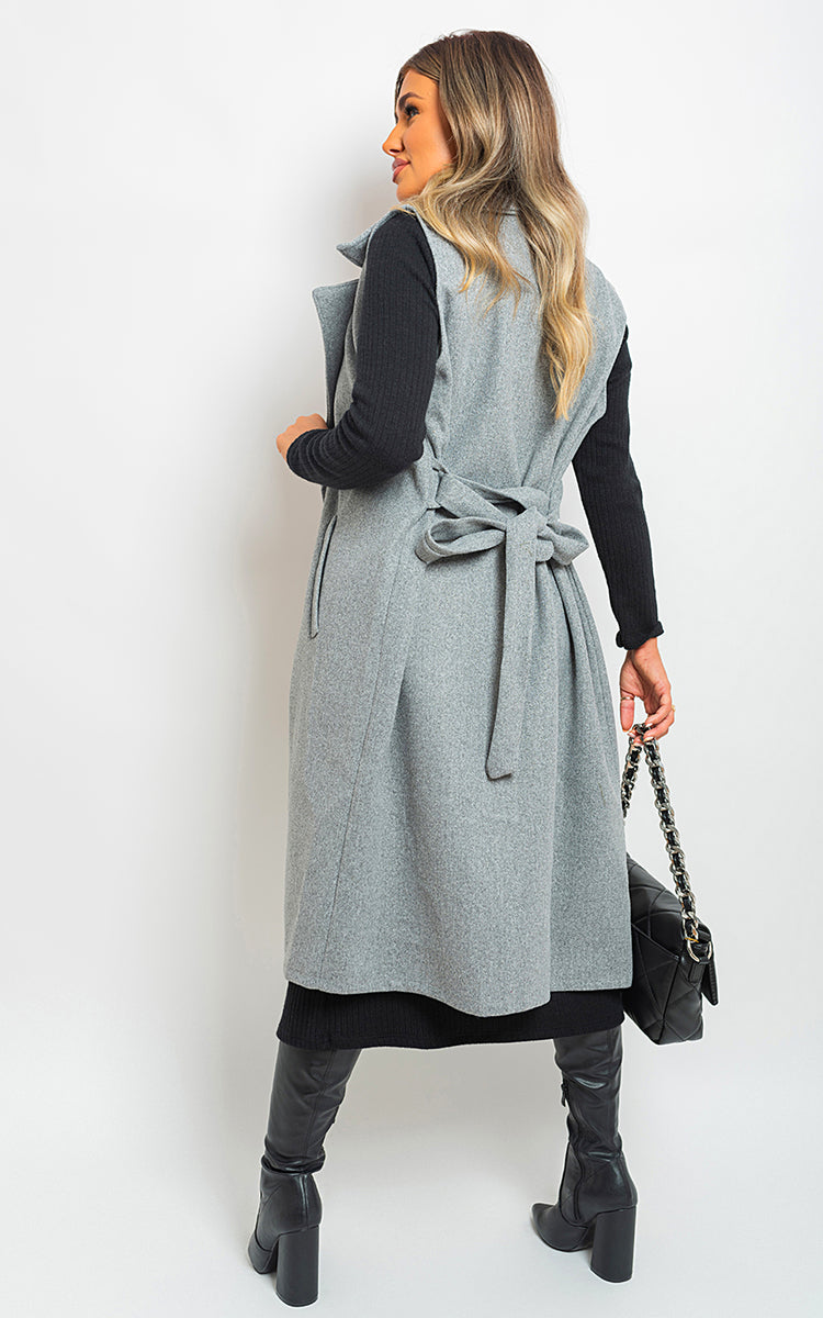 She Wears Glory™ Longline Sleeveless Wide Lapel Waist Tie Jacket - She Wears Glory Beverly Hills