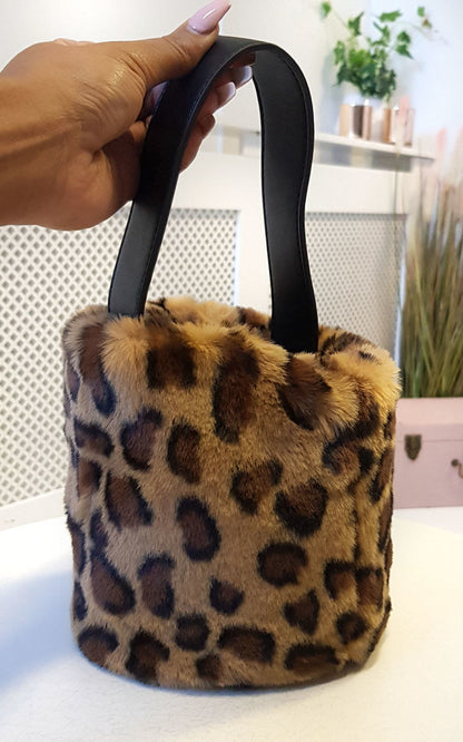 She Wears Glory™ Fluffy Pouch Bag